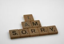 윤 대통령 “국민 뜻 잘 받들지 못해 죄송…더 잘해 나가겠다” brown wooden letter blocks on white surface