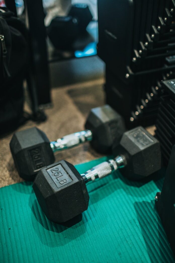 Photo by Nathan Dumlao 2 black and gray dumbbells