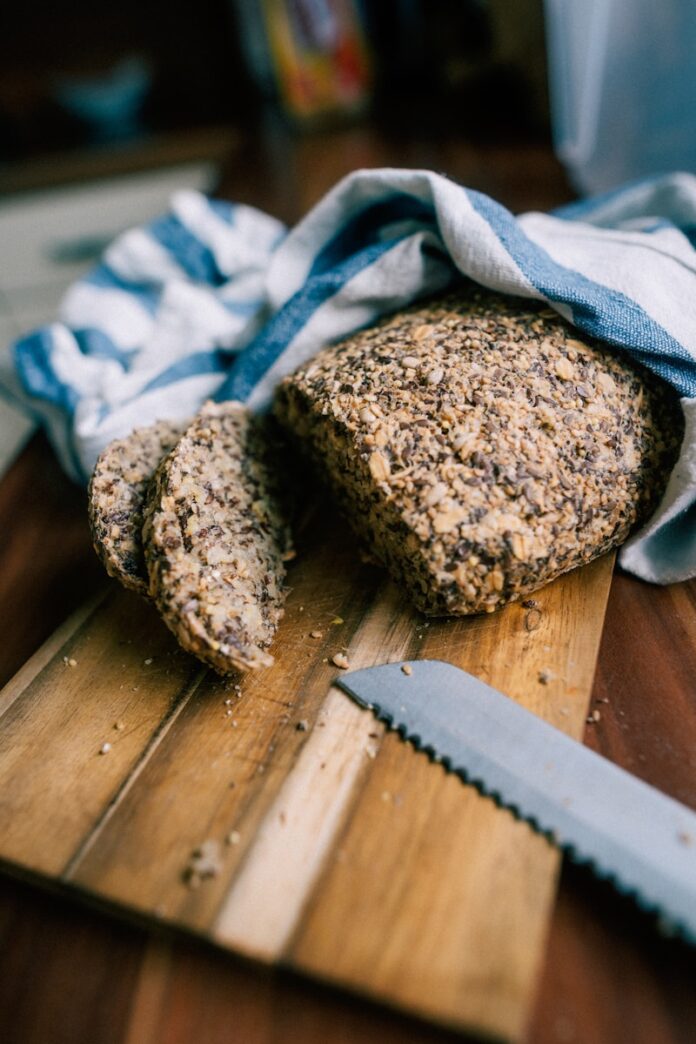 Photo by Max Saeling brown bread on brown wooden table