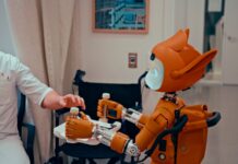 “집에서 시작하는 AI 건강 관리, 일상에 똑똑하게 스며든다” Man gives robot bottles on a tray